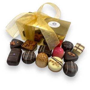 250 grams of Belgian bonbons in a gold box with decoration